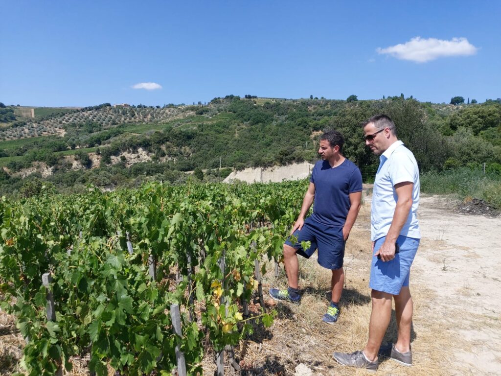 Roger Bissell exploring Italian wine and food at the Podere Le Ripi winery in Montalcino