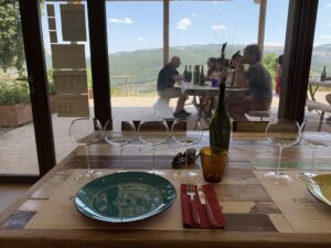 Roger Bissell exploring Italian wine and food at the Podere Le Ripi winery in Montalcino