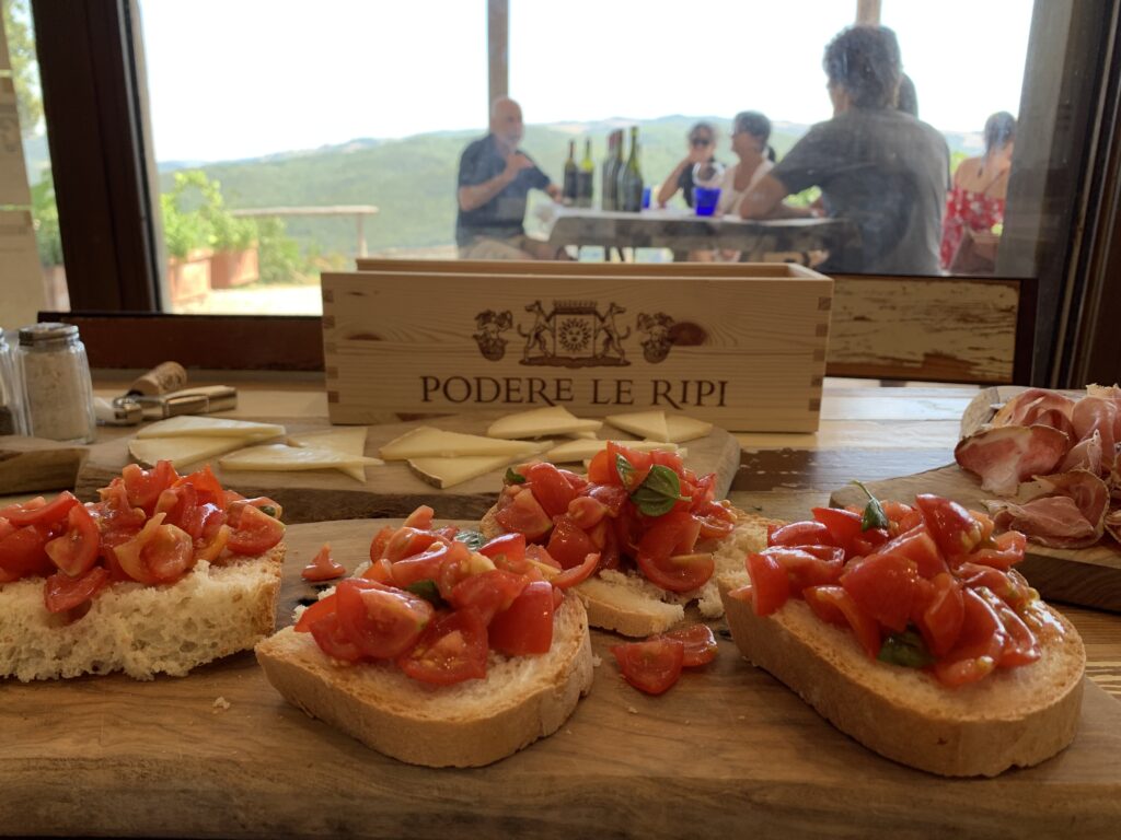 Roger Bissell exploring Italian wine and food at the Podere Le Ripi winery in Montalcino